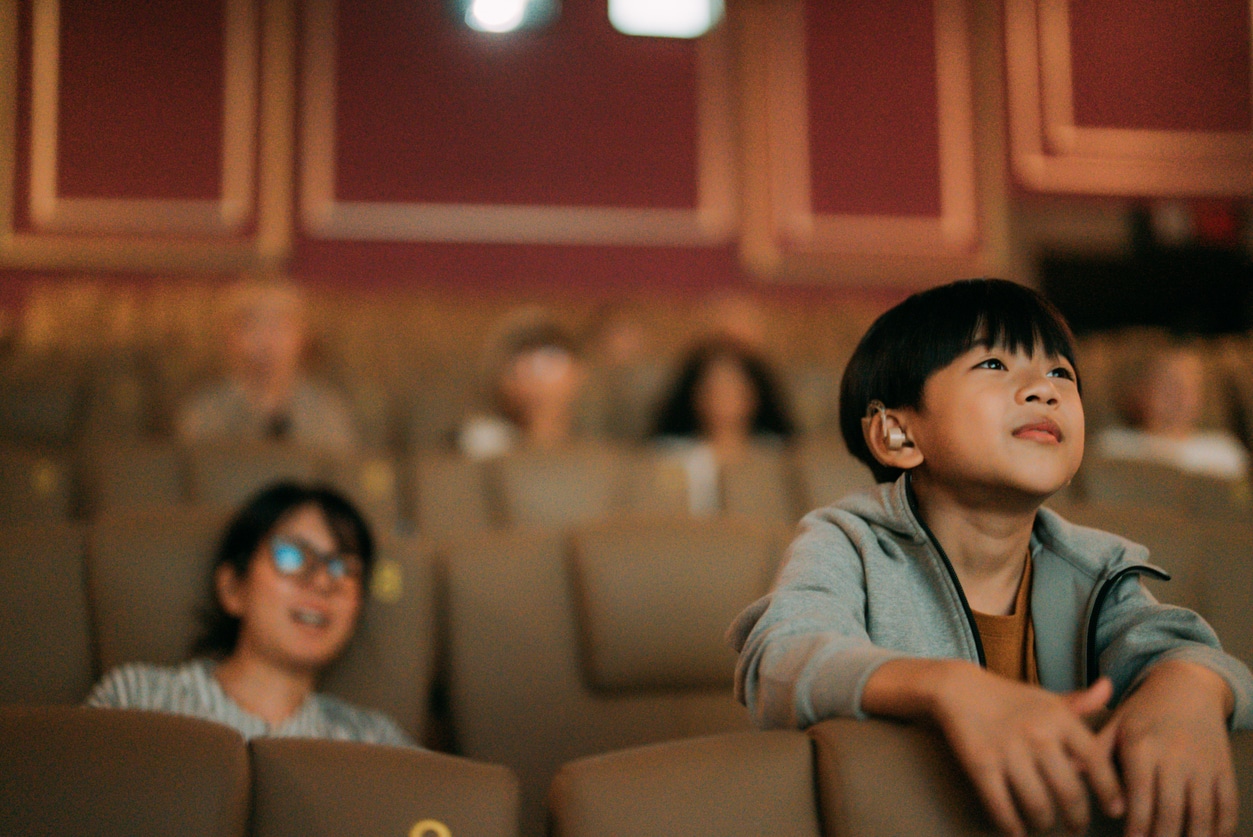 Boy with hearing loss sees a movie