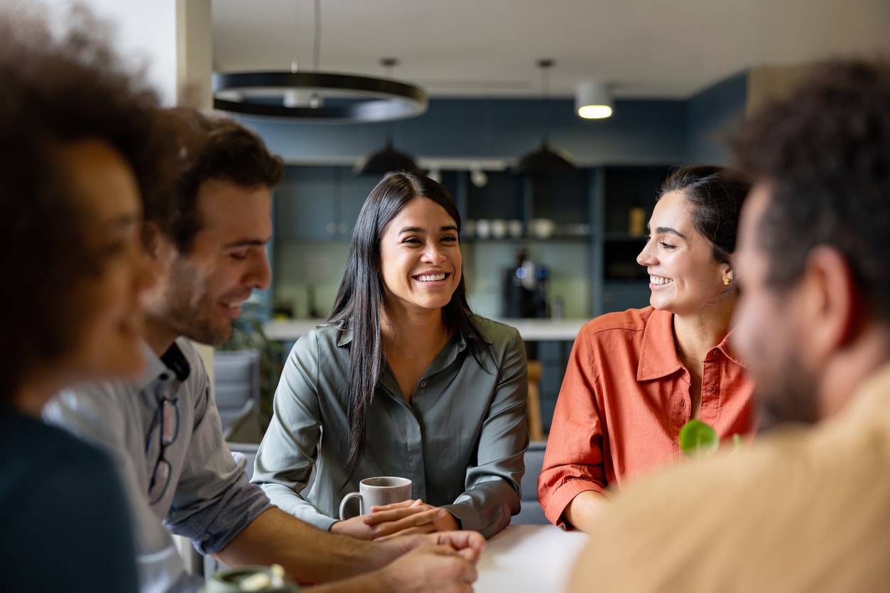 Happy woman talking with her friends